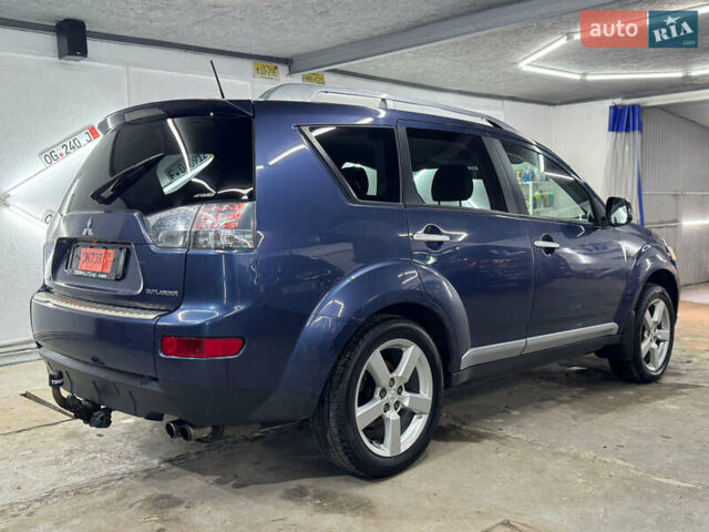 Синий Мицубиси Аутлендер, объемом двигателя 2 л и пробегом 228 тыс. км за 7999 $, фото 6 на Automoto.ua