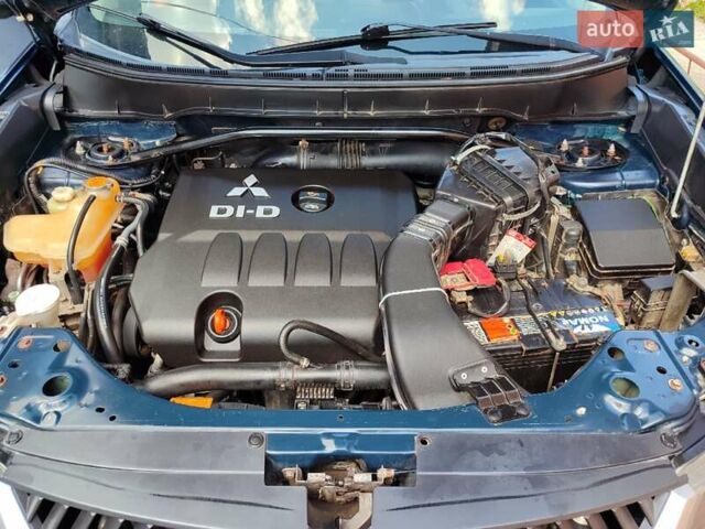 Синий Мицубиси Аутлендер, объемом двигателя 1.97 л и пробегом 196 тыс. км за 8950 $, фото 26 на Automoto.ua