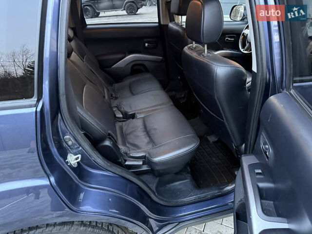 Синий Мицубиси Аутлендер, объемом двигателя 2 л и пробегом 228 тыс. км за 8888 $, фото 33 на Automoto.ua