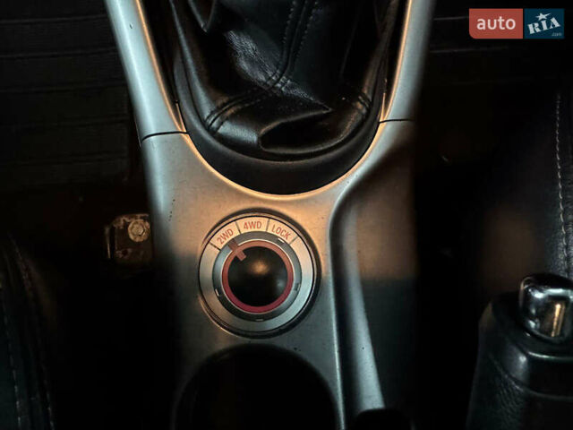 Синий Мицубиси Аутлендер, объемом двигателя 2 л и пробегом 228 тыс. км за 7999 $, фото 26 на Automoto.ua
