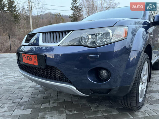 Синий Мицубиси Аутлендер, объемом двигателя 2 л и пробегом 228 тыс. км за 8888 $, фото 15 на Automoto.ua