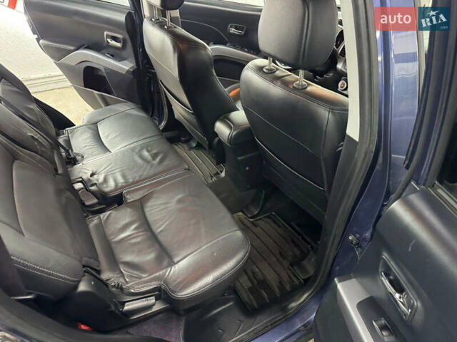 Синий Мицубиси Аутлендер, объемом двигателя 2 л и пробегом 228 тыс. км за 7999 $, фото 34 на Automoto.ua