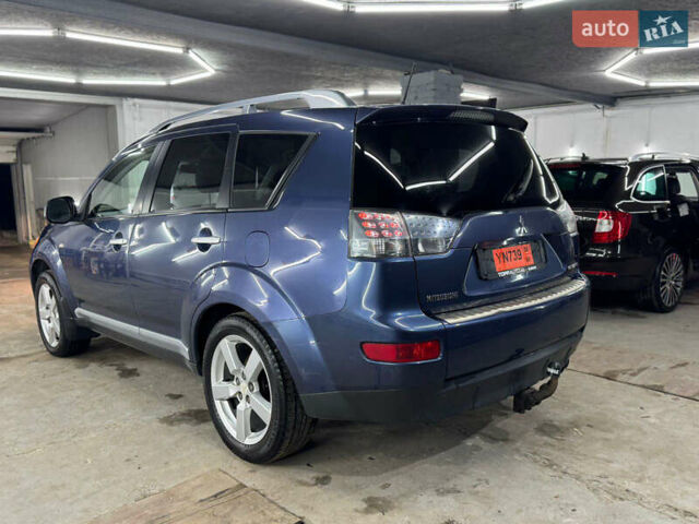Синий Мицубиси Аутлендер, объемом двигателя 2 л и пробегом 228 тыс. км за 7999 $, фото 5 на Automoto.ua