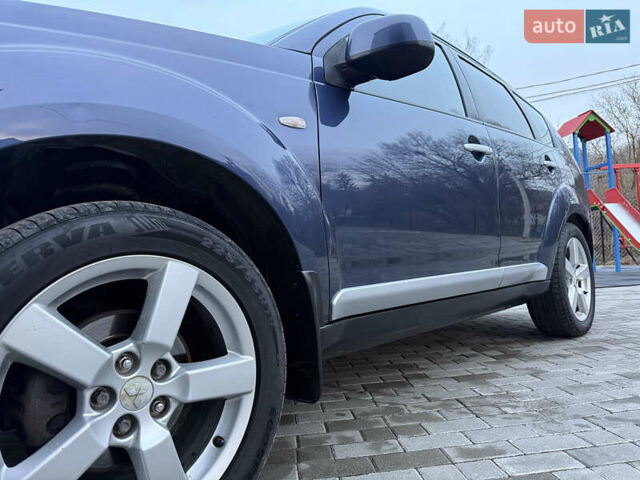 Синий Мицубиси Аутлендер, объемом двигателя 2 л и пробегом 228 тыс. км за 8888 $, фото 18 на Automoto.ua