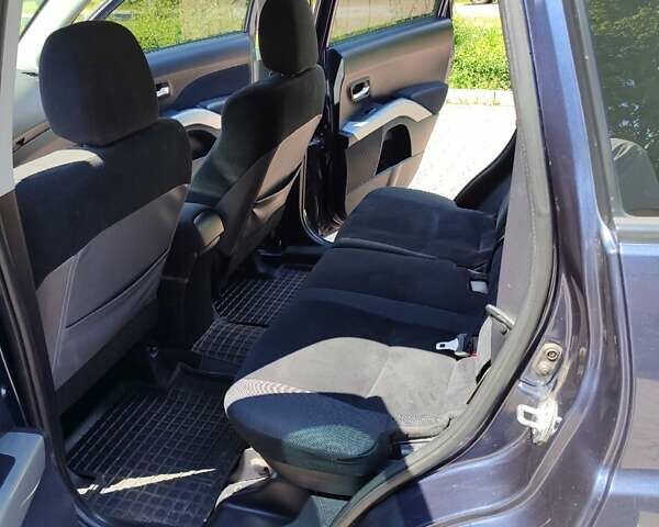 Синий Мицубиси Аутлендер, объемом двигателя 1.97 л и пробегом 196 тыс. км за 8950 $, фото 21 на Automoto.ua