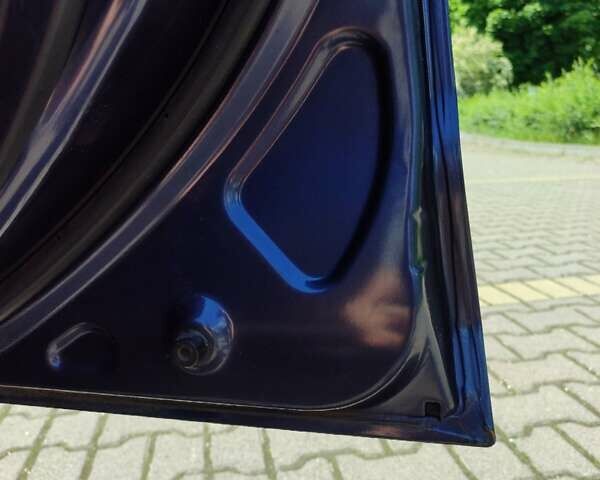 Синий Мицубиси Аутлендер, объемом двигателя 1.97 л и пробегом 196 тыс. км за 8950 $, фото 14 на Automoto.ua