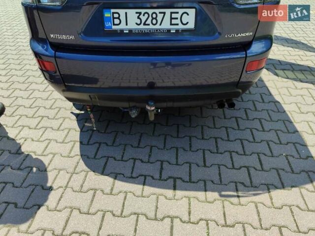 Синий Мицубиси Аутлендер, объемом двигателя 1.97 л и пробегом 196 тыс. км за 8950 $, фото 25 на Automoto.ua