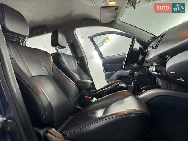 Синий Мицубиси Аутлендер, объемом двигателя 2 л и пробегом 228 тыс. км за 7999 $, фото 28 на Automoto.ua