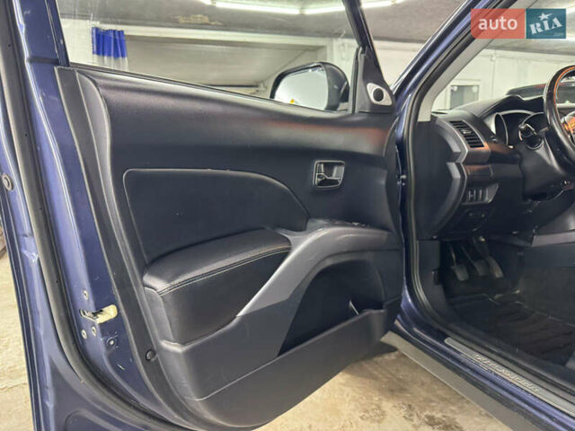 Синий Мицубиси Аутлендер, объемом двигателя 2 л и пробегом 228 тыс. км за 7999 $, фото 22 на Automoto.ua