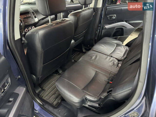 Синий Мицубиси Аутлендер, объемом двигателя 2 л и пробегом 228 тыс. км за 7999 $, фото 39 на Automoto.ua