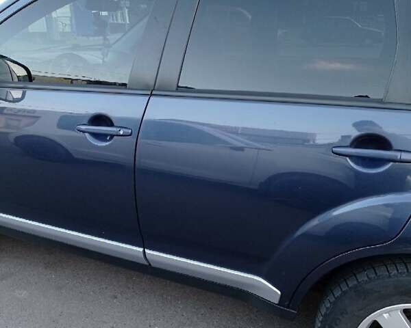 Синий Мицубиси Аутлендер, объемом двигателя 1.97 л и пробегом 196 тыс. км за 8950 $, фото 3 на Automoto.ua