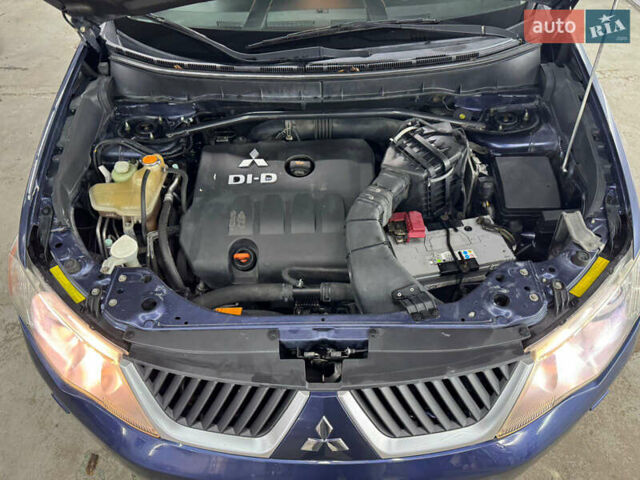 Синий Мицубиси Аутлендер, объемом двигателя 2 л и пробегом 228 тыс. км за 7999 $, фото 17 на Automoto.ua