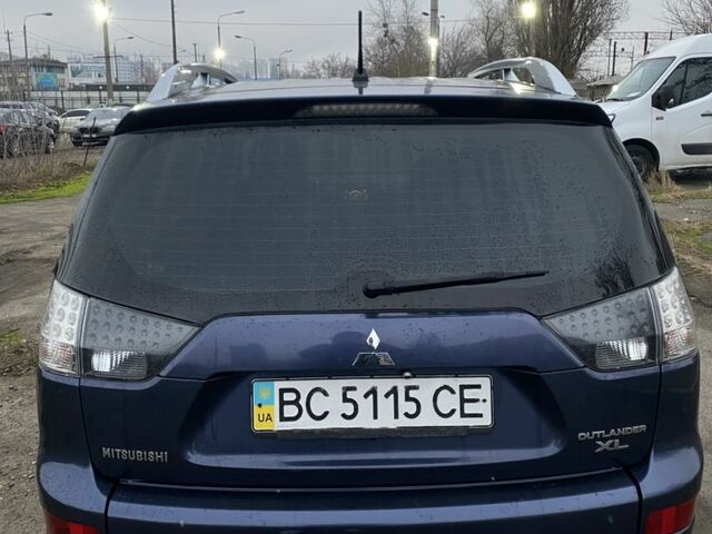 Синий Мицубиси Аутлендер, объемом двигателя 2.4 л и пробегом 250 тыс. км за 6300 $, фото 3 на Automoto.ua