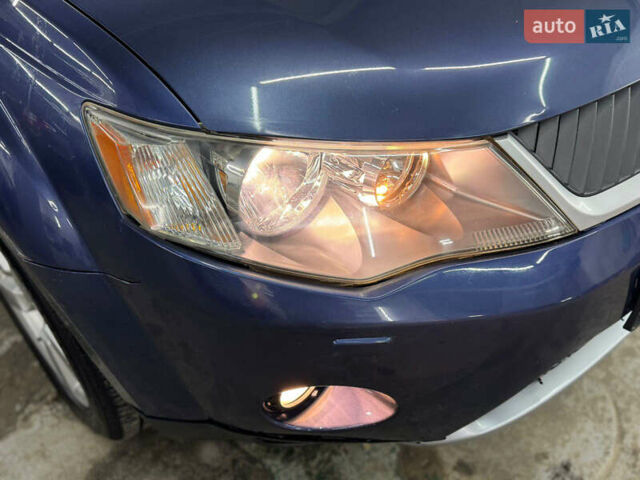Синий Мицубиси Аутлендер, объемом двигателя 2 л и пробегом 228 тыс. км за 7999 $, фото 10 на Automoto.ua