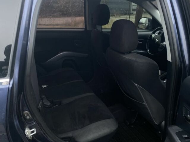 Синий Мицубиси Аутлендер, объемом двигателя 2.4 л и пробегом 250 тыс. км за 6300 $, фото 4 на Automoto.ua