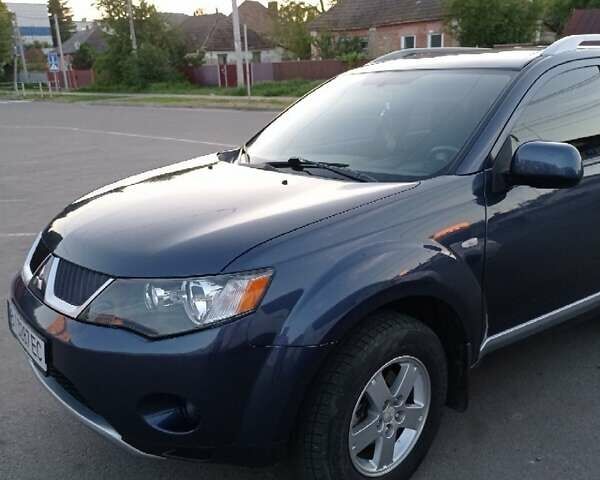 Синий Мицубиси Аутлендер, объемом двигателя 1.97 л и пробегом 196 тыс. км за 8950 $, фото 2 на Automoto.ua