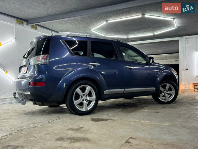 Синий Мицубиси Аутлендер, объемом двигателя 2 л и пробегом 228 тыс. км за 7999 $, фото 8 на Automoto.ua