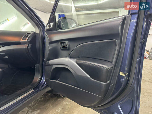 Синий Мицубиси Аутлендер, объемом двигателя 2 л и пробегом 228 тыс. км за 7999 $, фото 31 на Automoto.ua