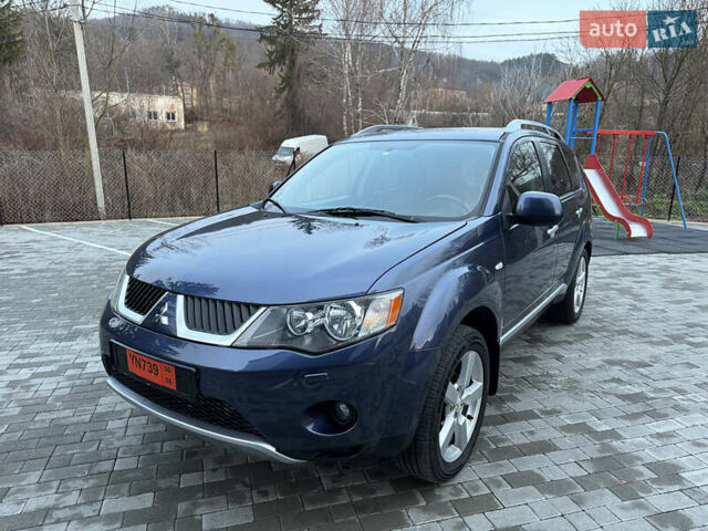 Синий Мицубиси Аутлендер, объемом двигателя 2 л и пробегом 228 тыс. км за 8888 $, фото 14 на Automoto.ua