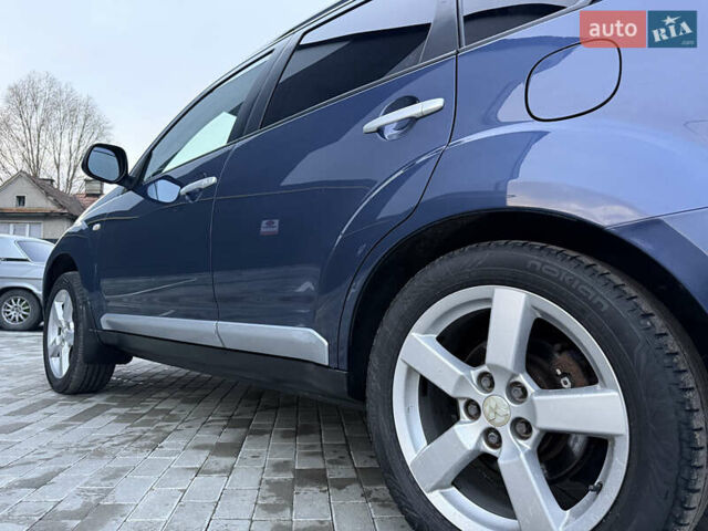 Синий Мицубиси Аутлендер, объемом двигателя 2 л и пробегом 228 тыс. км за 8888 $, фото 19 на Automoto.ua