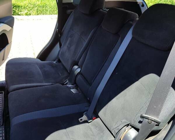 Синий Мицубиси Аутлендер, объемом двигателя 1.97 л и пробегом 196 тыс. км за 8950 $, фото 22 на Automoto.ua