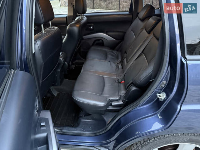 Синий Мицубиси Аутлендер, объемом двигателя 2 л и пробегом 228 тыс. км за 8888 $, фото 30 на Automoto.ua