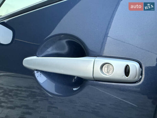 Синий Мицубиси Аутлендер, объемом двигателя 2 л и пробегом 228 тыс. км за 8888 $, фото 48 на Automoto.ua