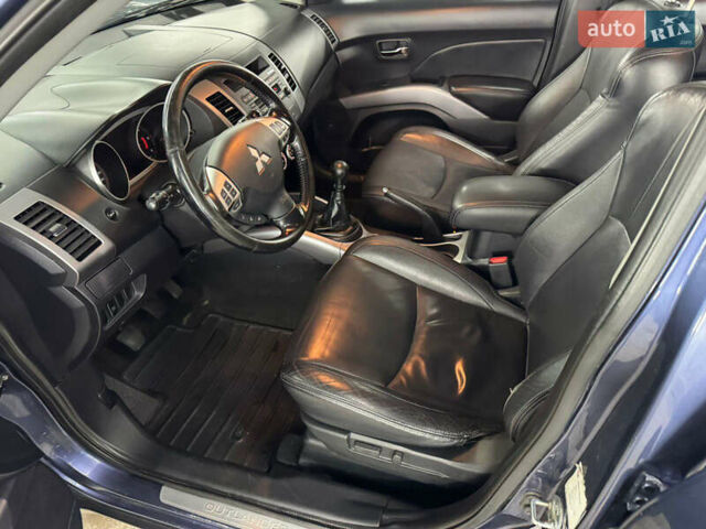 Синий Мицубиси Аутлендер, объемом двигателя 2 л и пробегом 228 тыс. км за 7999 $, фото 18 на Automoto.ua