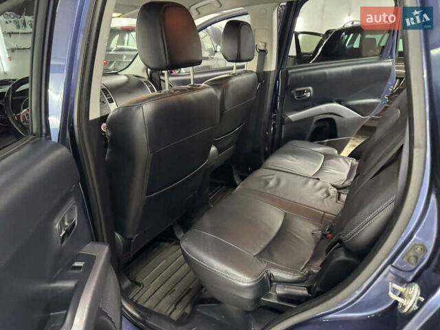 Синий Мицубиси Аутлендер, объемом двигателя 2 л и пробегом 228 тыс. км за 7999 $, фото 37 на Automoto.ua