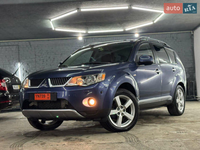 Синий Мицубиси Аутлендер, объемом двигателя 2 л и пробегом 228 тыс. км за 7999 $, фото 9 на Automoto.ua