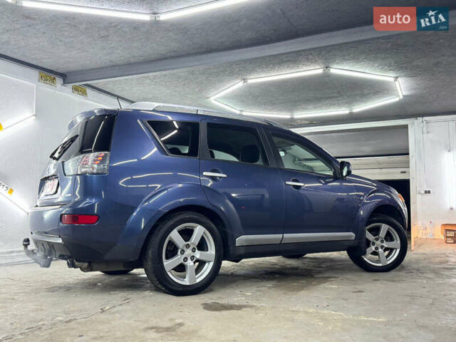 Синий Мицубиси Аутлендер, объемом двигателя 2 л и пробегом 228 тыс. км за 7999 $, фото 7 на Automoto.ua