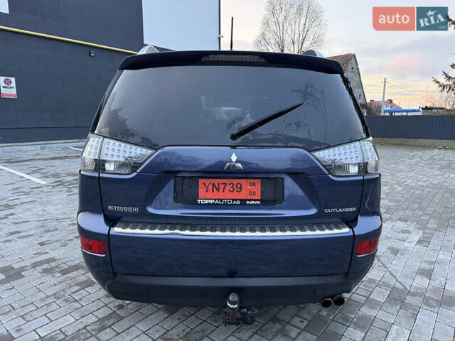 Синий Мицубиси Аутлендер, объемом двигателя 2 л и пробегом 228 тыс. км за 8888 $, фото 8 на Automoto.ua