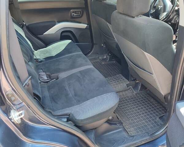 Синий Мицубиси Аутлендер, объемом двигателя 1.97 л и пробегом 196 тыс. км за 8950 $, фото 17 на Automoto.ua