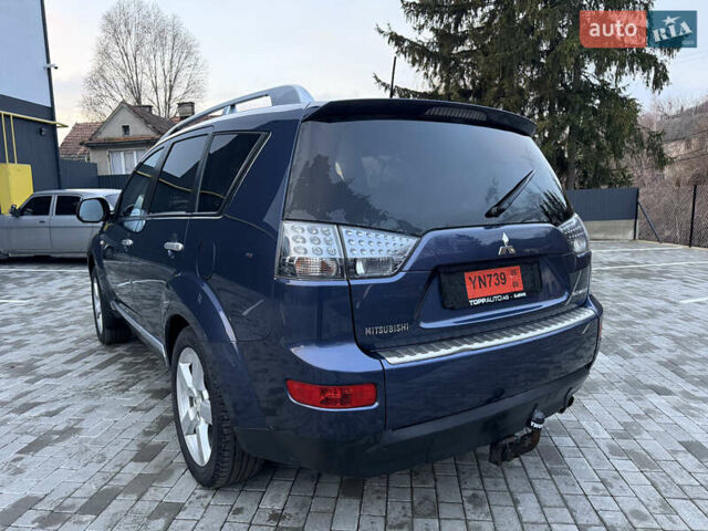 Синий Мицубиси Аутлендер, объемом двигателя 2 л и пробегом 228 тыс. км за 8888 $, фото 7 на Automoto.ua