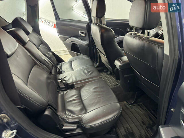 Синий Мицубиси Аутлендер, объемом двигателя 2 л и пробегом 228 тыс. км за 7999 $, фото 35 на Automoto.ua