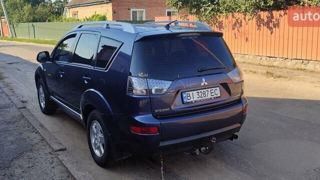 Синий Мицубиси Аутлендер, объемом двигателя 1.97 л и пробегом 196 тыс. км за 8950 $, фото 11 на Automoto.ua