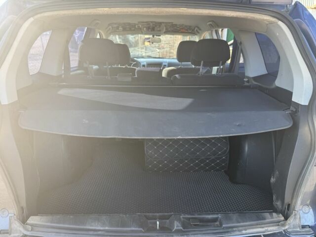 Синій Міцубісі Аутлендер, об'ємом двигуна 2 л та пробігом 378 тис. км за 4800 $, фото 7 на Automoto.ua