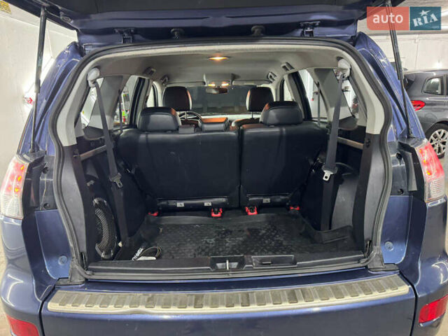 Синий Мицубиси Аутлендер, объемом двигателя 2 л и пробегом 228 тыс. км за 7999 $, фото 44 на Automoto.ua
