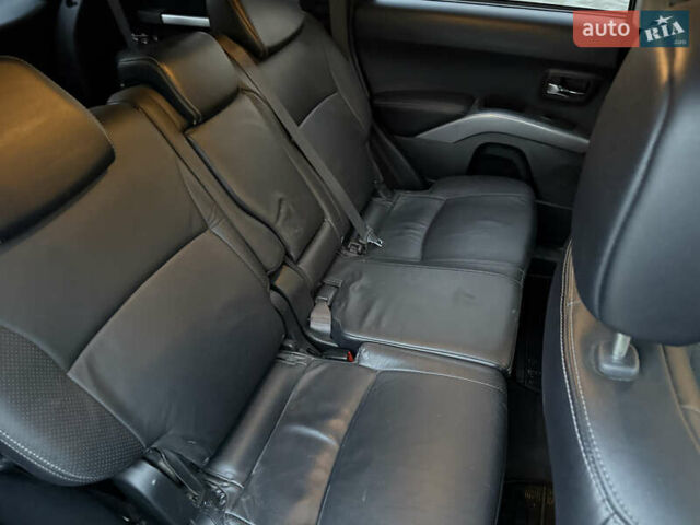 Синий Мицубиси Аутлендер, объемом двигателя 2 л и пробегом 228 тыс. км за 8888 $, фото 36 на Automoto.ua