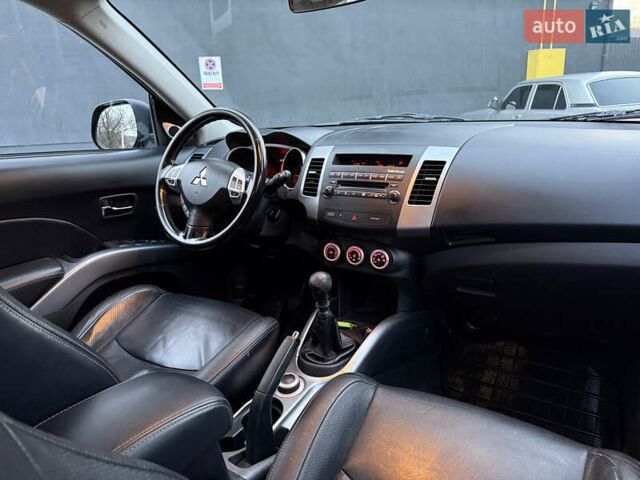 Синий Мицубиси Аутлендер, объемом двигателя 2 л и пробегом 228 тыс. км за 8888 $, фото 34 на Automoto.ua