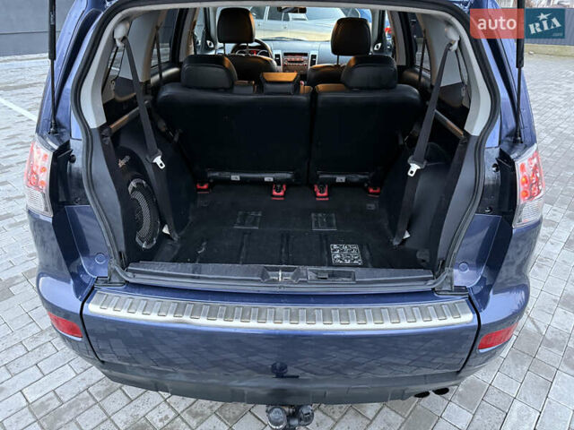 Синий Мицубиси Аутлендер, объемом двигателя 2 л и пробегом 228 тыс. км за 8888 $, фото 44 на Automoto.ua