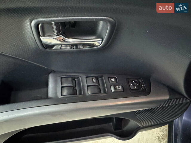 Синий Мицубиси Аутлендер, объемом двигателя 2 л и пробегом 228 тыс. км за 7999 $, фото 20 на Automoto.ua