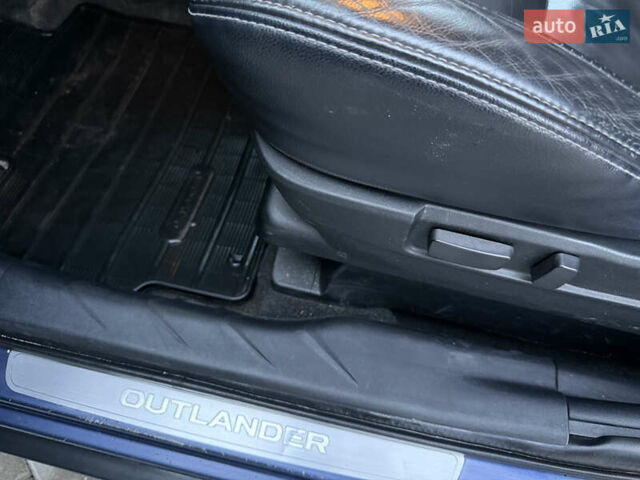 Синий Мицубиси Аутлендер, объемом двигателя 2 л и пробегом 228 тыс. км за 8888 $, фото 22 на Automoto.ua