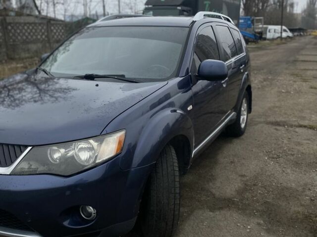 Синий Мицубиси Аутлендер, объемом двигателя 2.4 л и пробегом 250 тыс. км за 6300 $, фото 2 на Automoto.ua