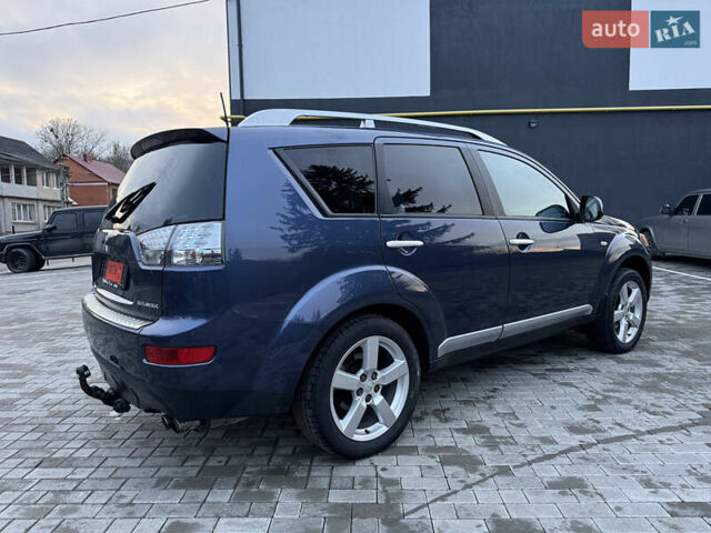 Синий Мицубиси Аутлендер, объемом двигателя 2 л и пробегом 228 тыс. км за 8888 $, фото 10 на Automoto.ua