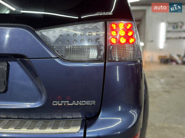 Синий Мицубиси Аутлендер, объемом двигателя 2 л и пробегом 228 тыс. км за 7999 $, фото 13 на Automoto.ua
