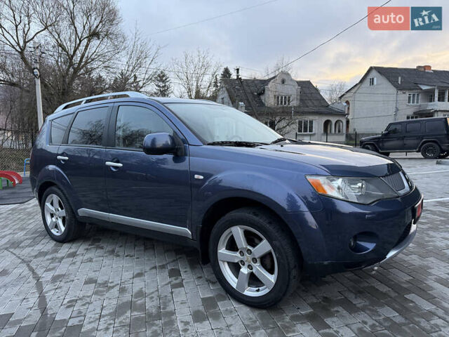 Синий Мицубиси Аутлендер, объемом двигателя 2 л и пробегом 228 тыс. км за 8888 $, фото 12 на Automoto.ua