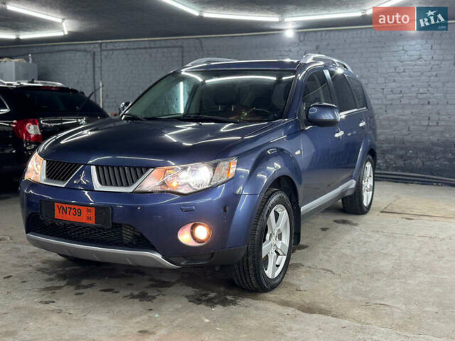 Синий Мицубиси Аутлендер, объемом двигателя 2 л и пробегом 228 тыс. км за 7999 $, фото 4 на Automoto.ua