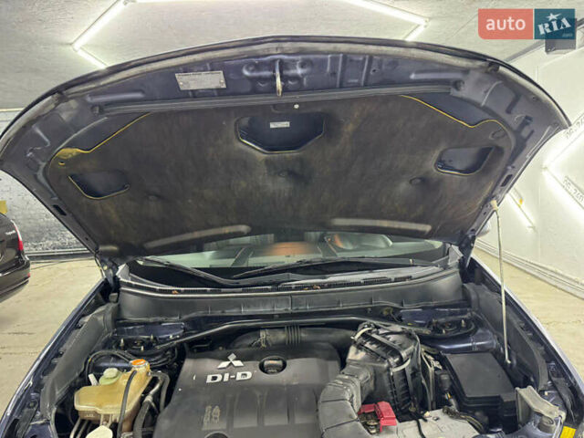 Синий Мицубиси Аутлендер, объемом двигателя 2 л и пробегом 228 тыс. км за 7999 $, фото 45 на Automoto.ua