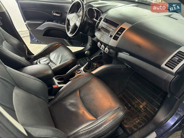 Синий Мицубиси Аутлендер, объемом двигателя 2 л и пробегом 228 тыс. км за 7999 $, фото 33 на Automoto.ua